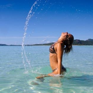 Woman swimming in the ocean