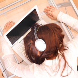 Woman asleep on her computer