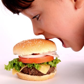 Child eating a burger