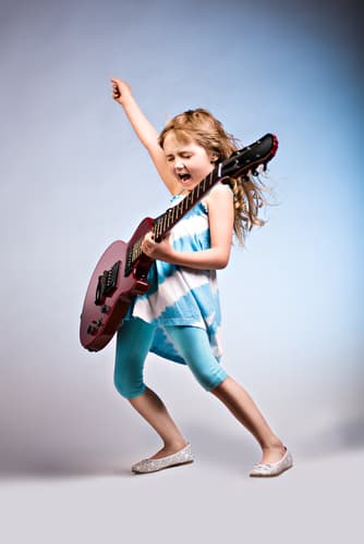 solo girl playing guitar