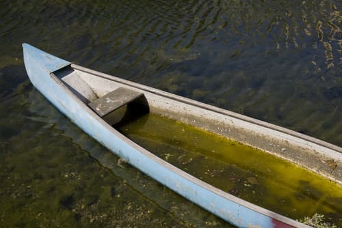 leaking boat in river